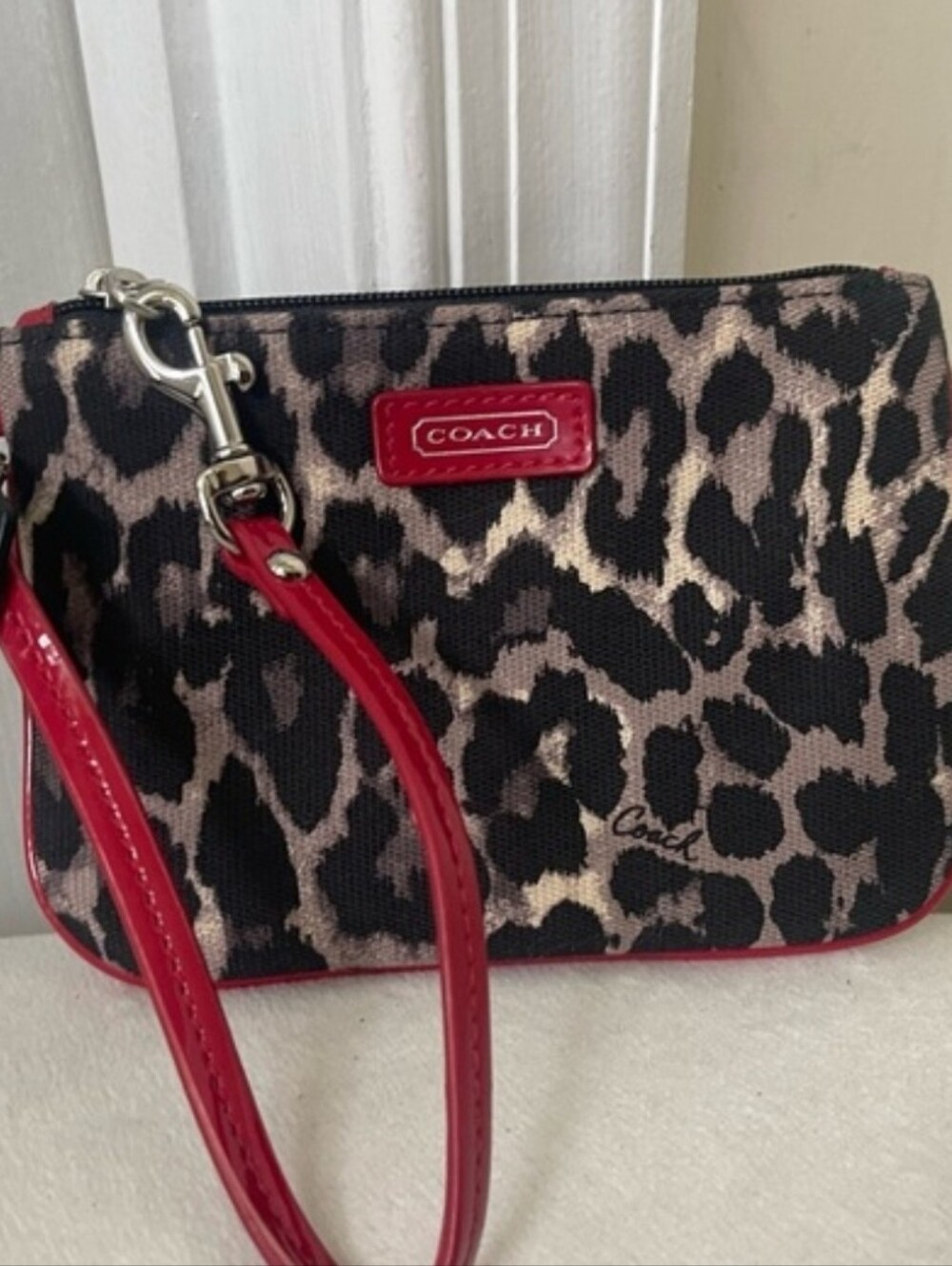 Coach Leopard Print Wristlet with Red Trim and Strap